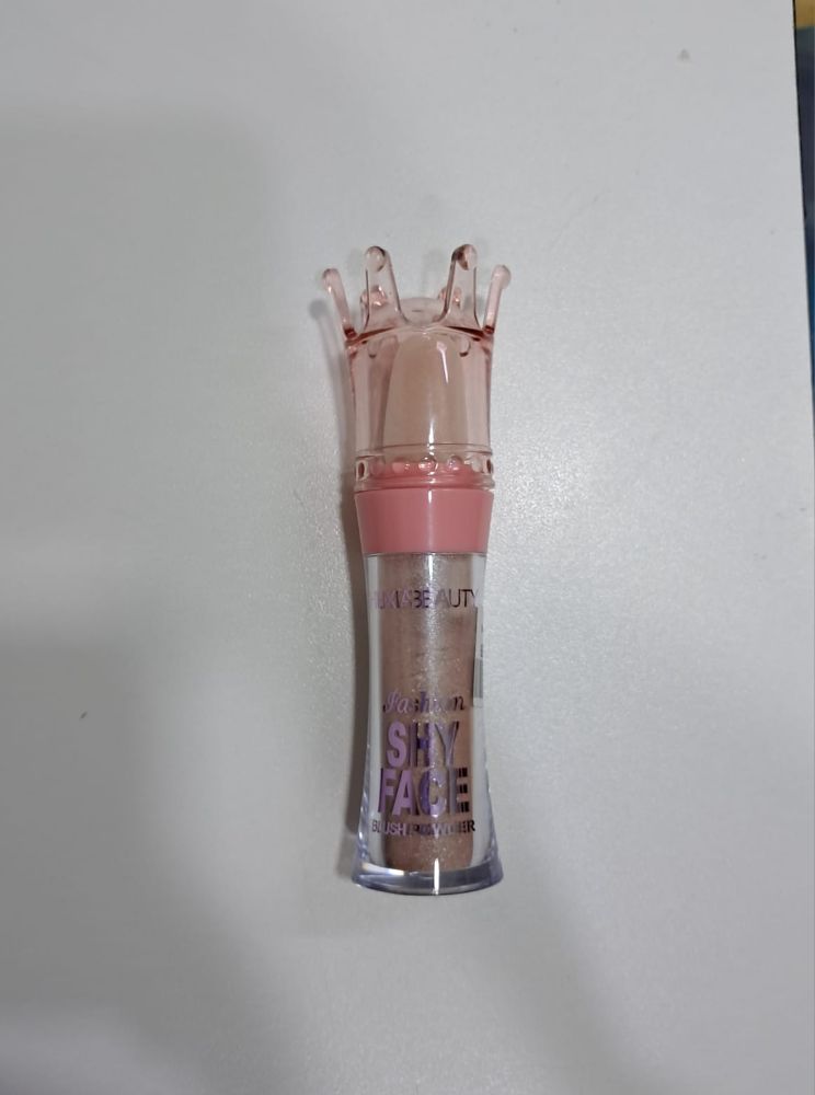 Imagen de ILUMINADOR DORADO Y LILA HUXIABEAUTY 7095